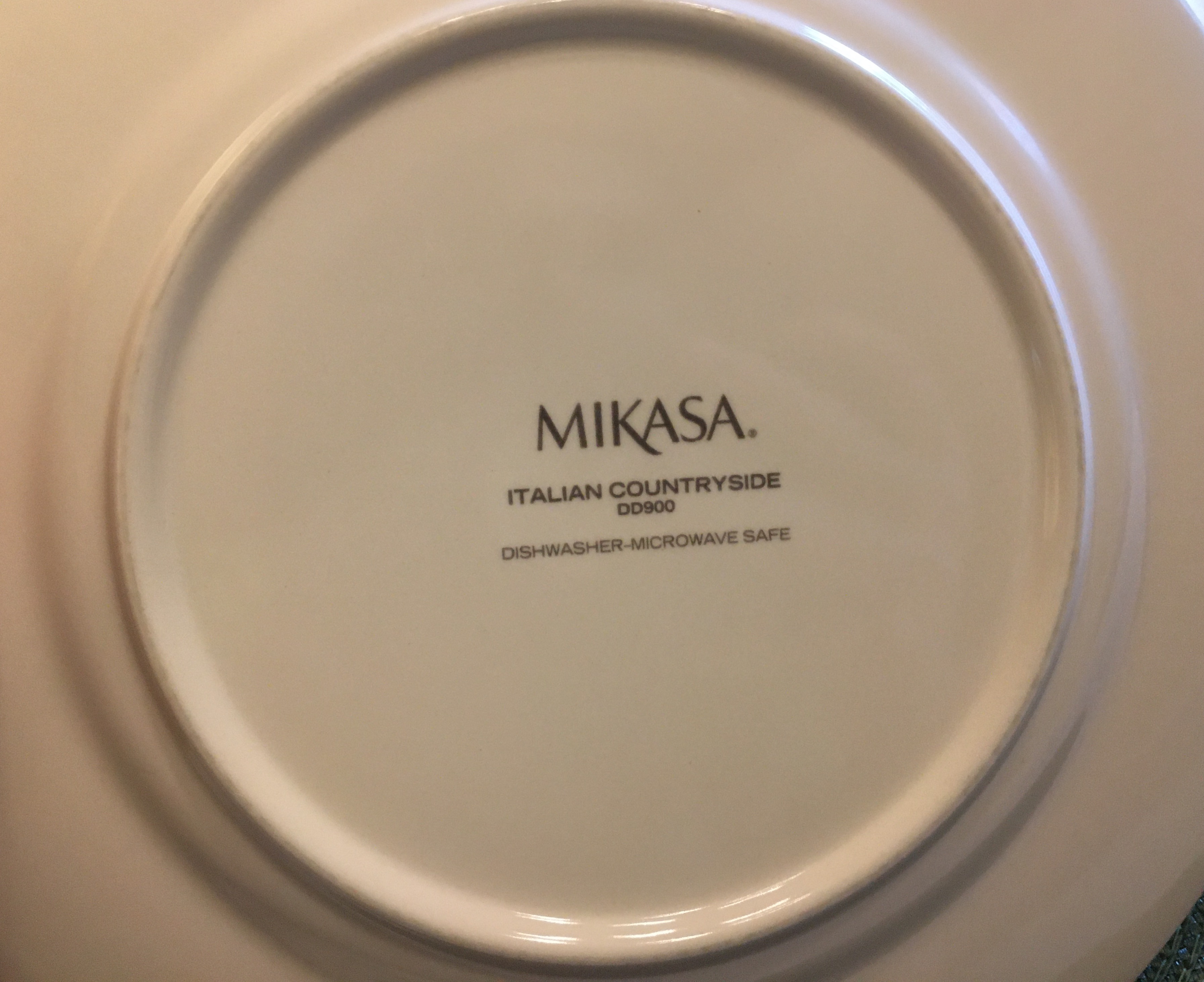 Authenticity seal on the back of plate