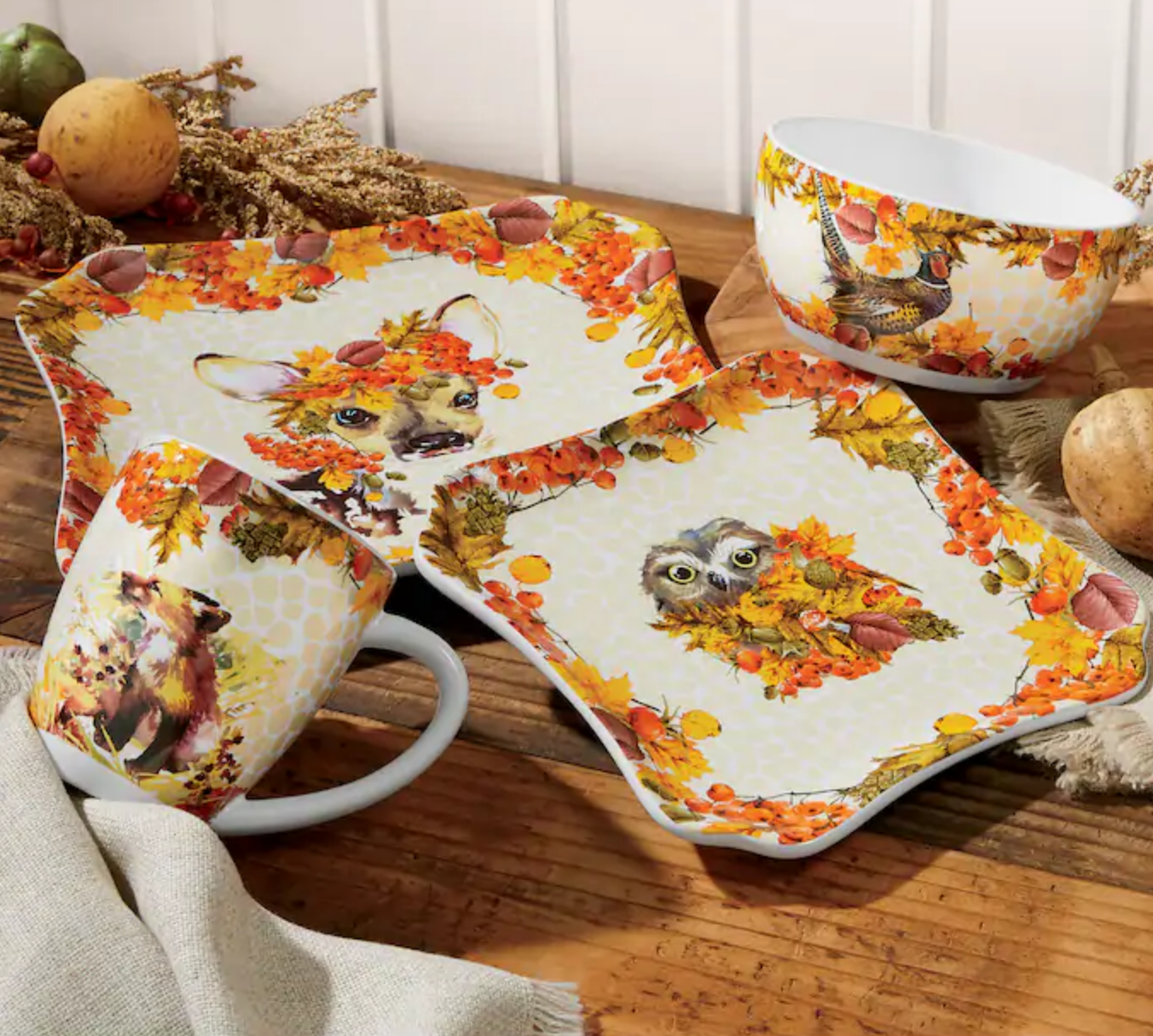 Four dishes with fall-themed decorations